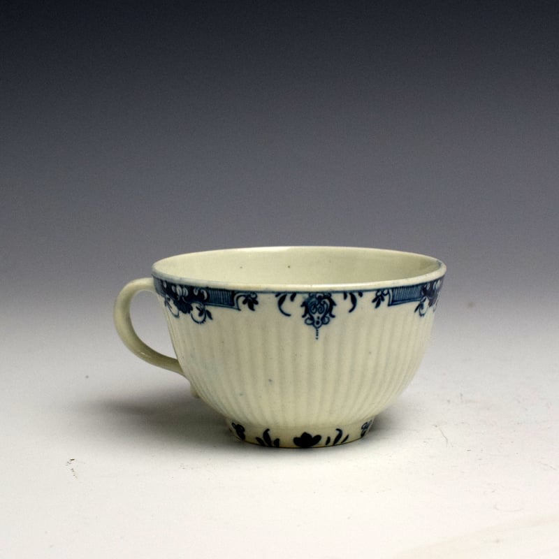 Early Worcester Rib Moulded Tea Cup and Saucer with Lambrequin Border c1760 (4)
