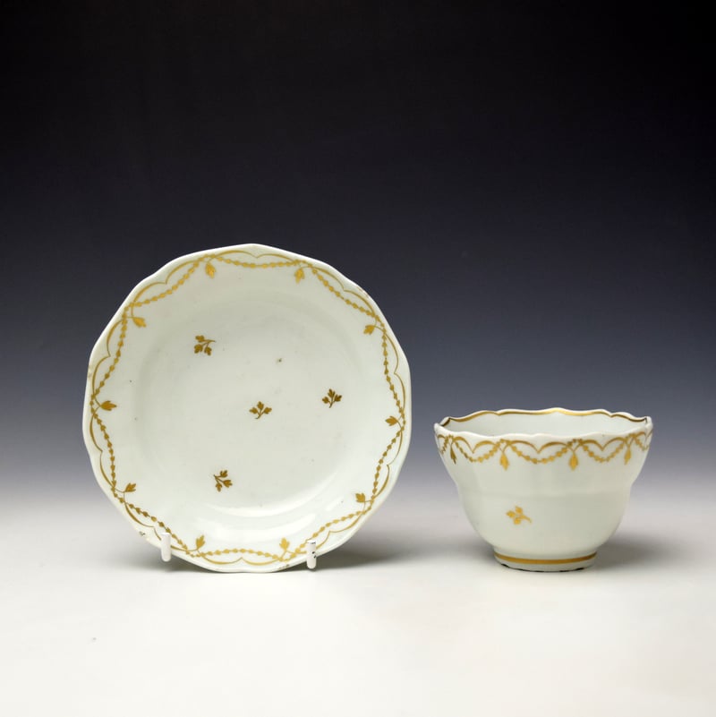 Gilded Floral Sprigs and Border Pattern Teabowl and Saucer c1790-1800