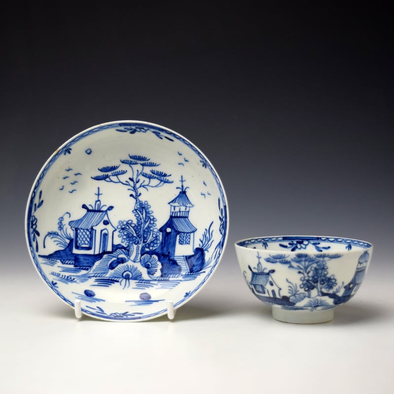Two Houses on a Rocky Island Pattern Teabowl and Saucer c1775-80