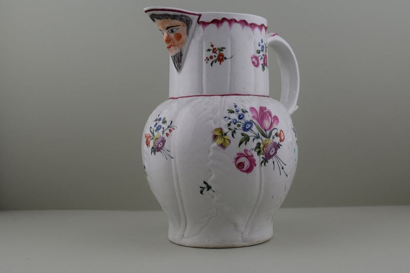 Baddeley Littler Porcelain Mask Spout jug, C1770. b