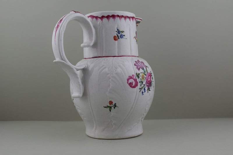 Baddeley Littler Porcelain Mask Spout jug, C1770. f