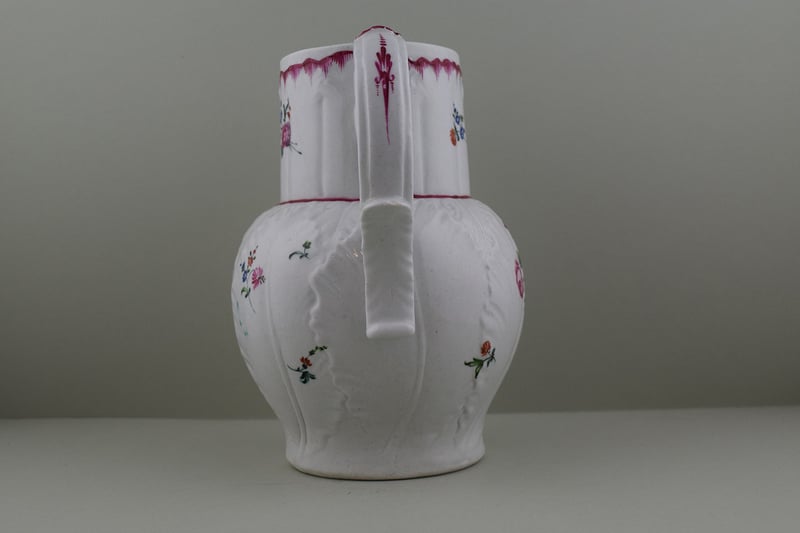Baddeley Littler Porcelain Mask Spout jug, C1770. g