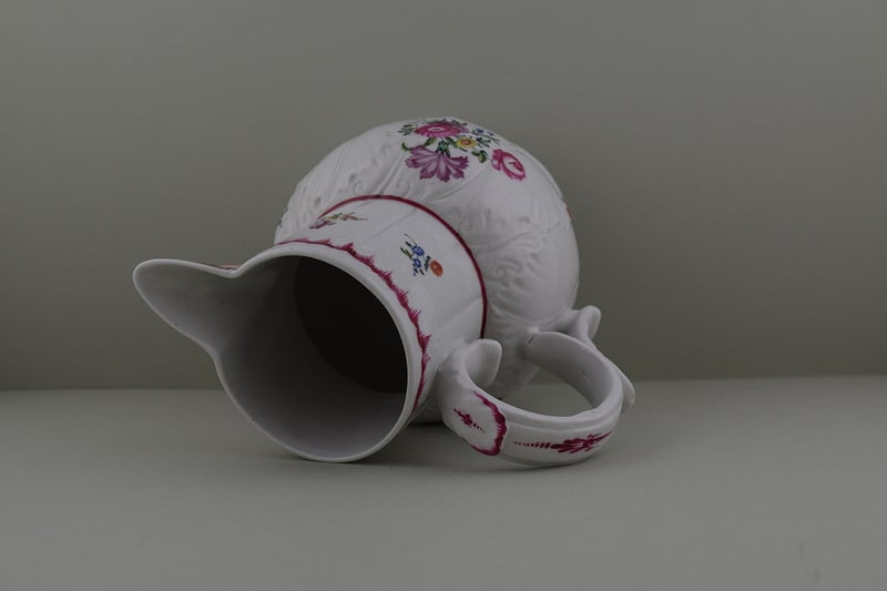 Baddeley Littler Porcelain Mask Spout jug, C1770. i